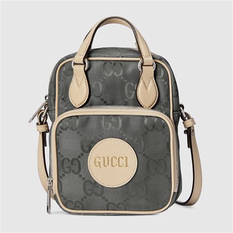 gucci econyl luggage.